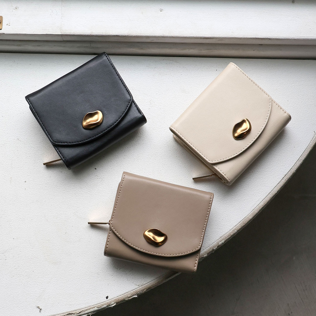 CAMELLIA / 牛革ニュアンスパーツ二つ折り財布